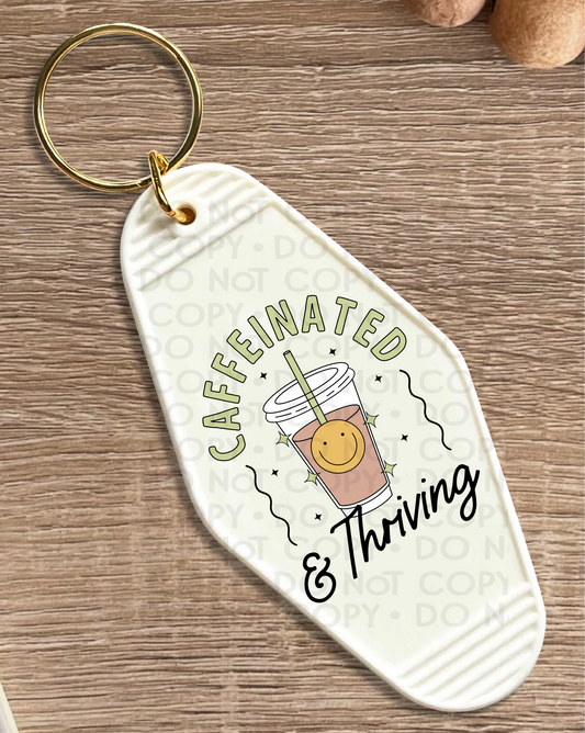 Caffeinated and thriving - UV DTF Keychain Decal