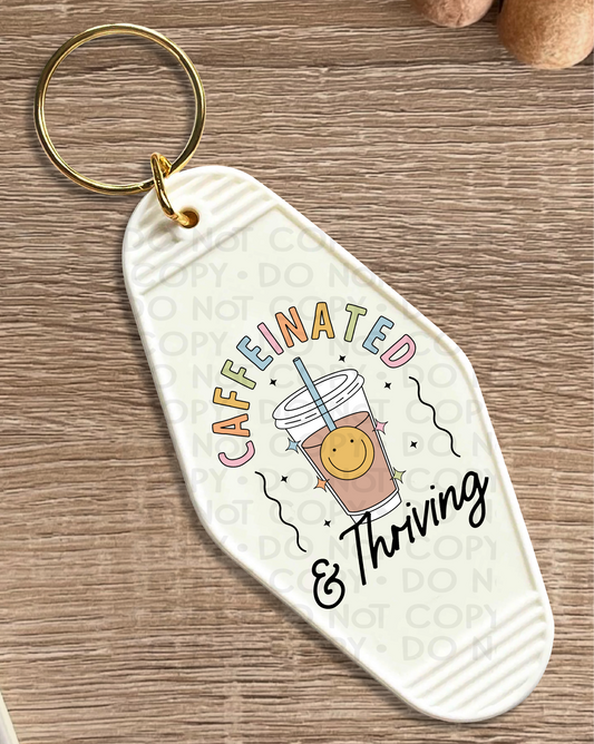 Caffeinated and thriving - UV DTF Keychain Decal